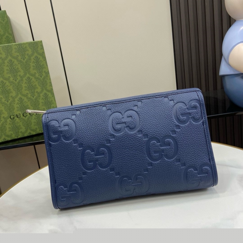 G*u*i clutch bags